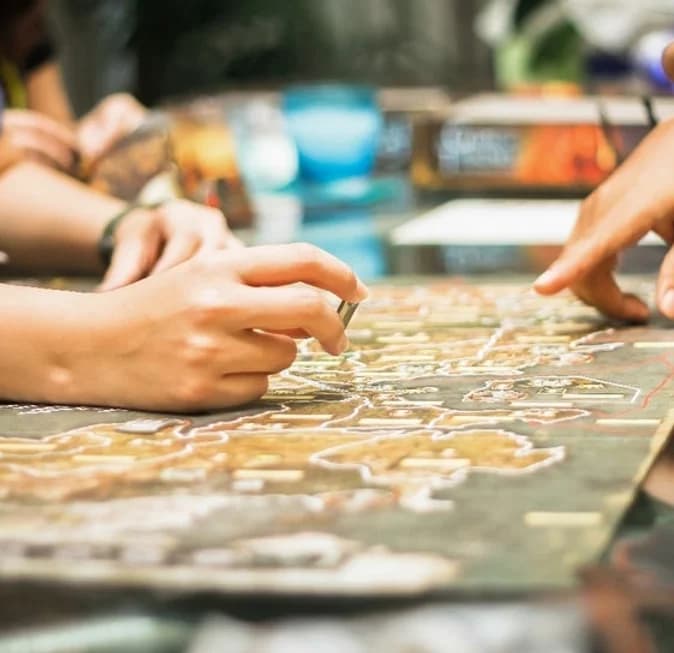 People playing a board game